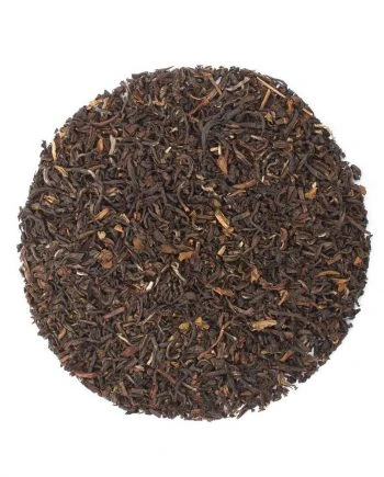 Darjeeling loos leaf tea leaves in a circle.
